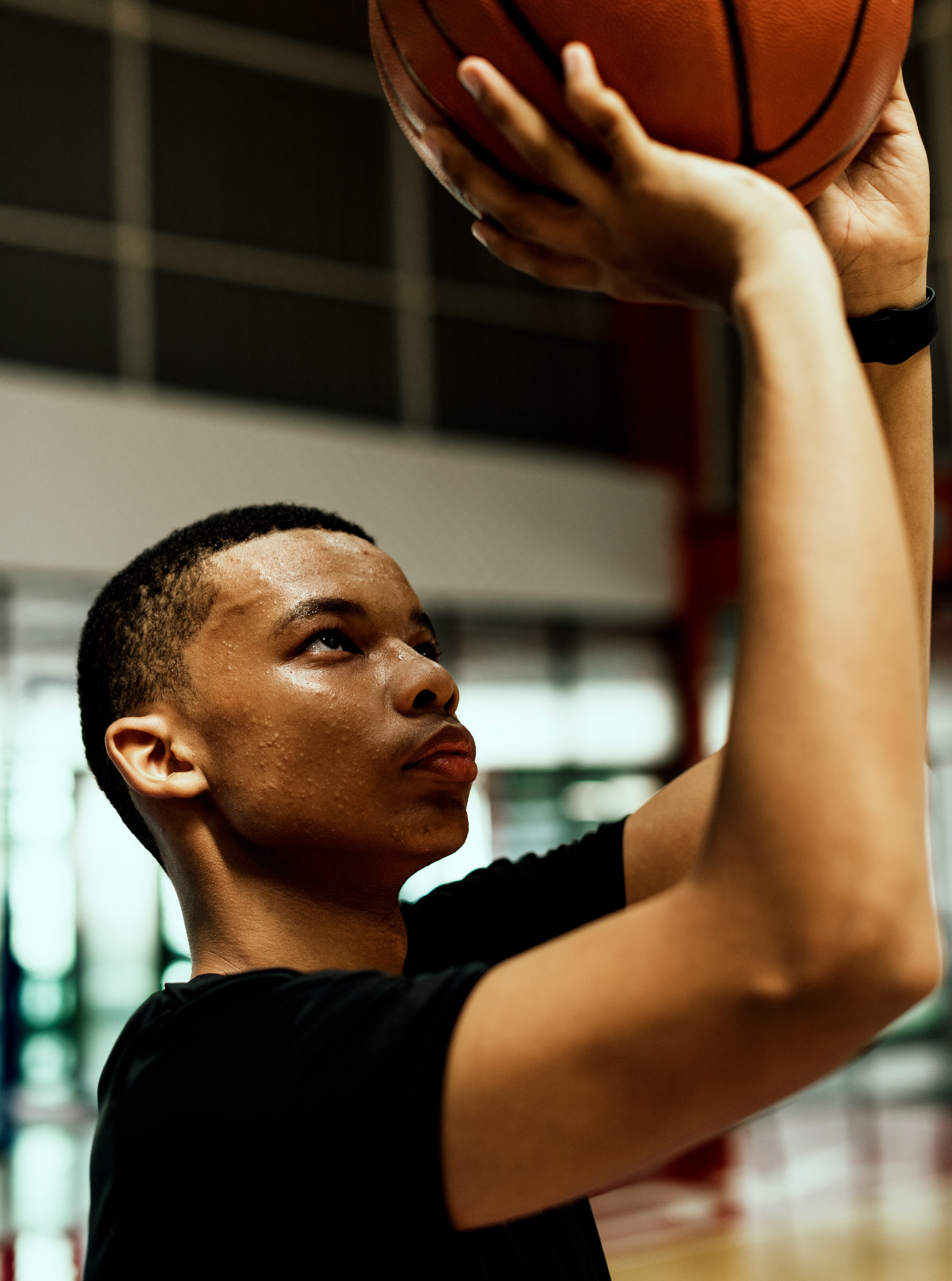 Athlete elevating for a layup during Winnipeg basketball training